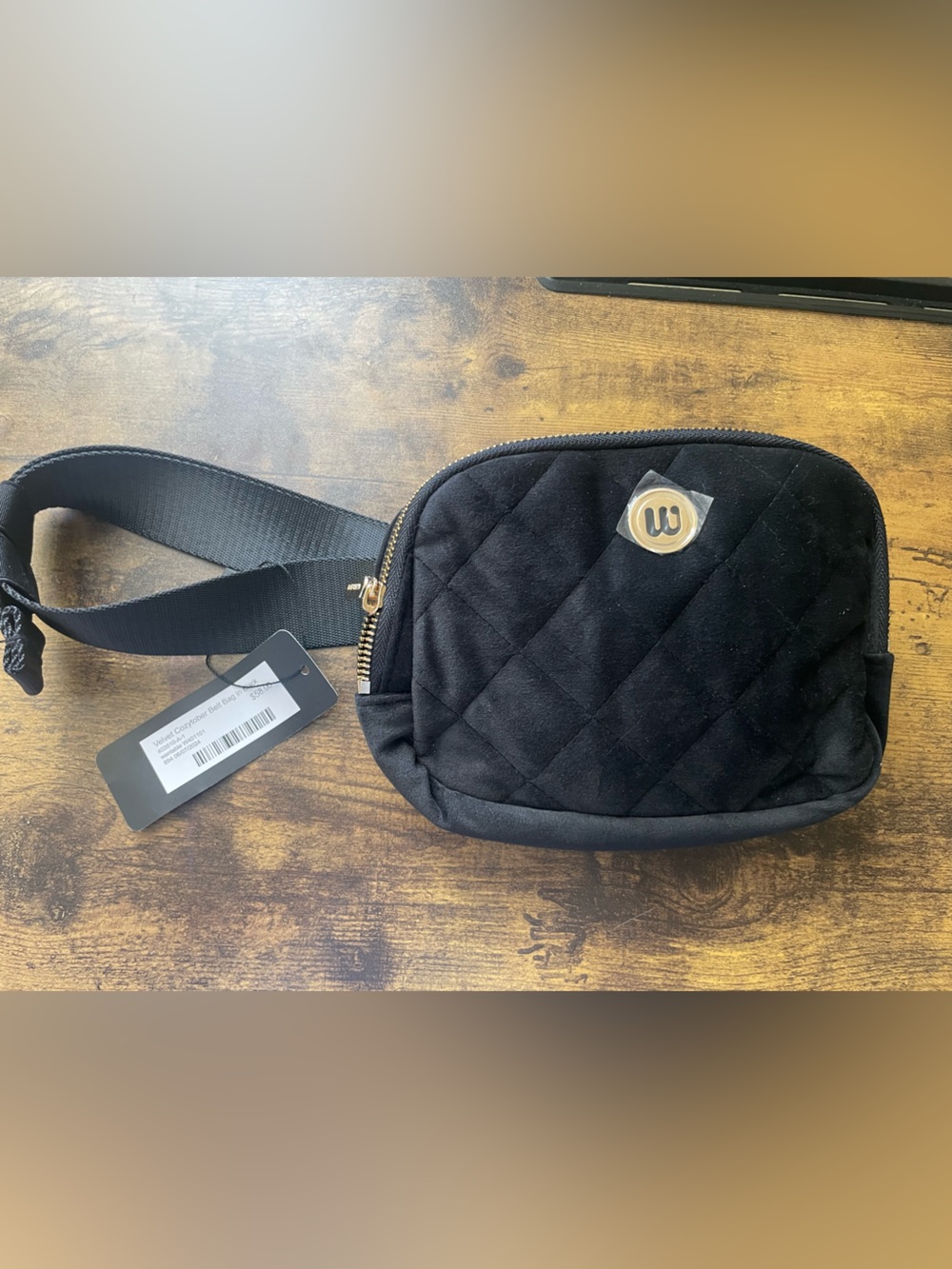 Quilted Black Crossbody Belt Bag with Gold Emblem